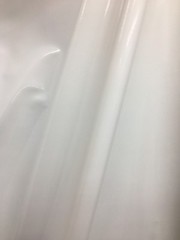 WHITE SHINY GLOSSY PVC PLEATHER STRETCH FABRIC (58 in.) Sold By The Yard