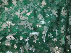 Green and Silver Sharmrock Print on Green Mesh Fabric 60 W x 2 yd AS IS Damaged