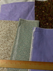 1 pound envelope of cotton fabric remnant pieces /variois colors and prints