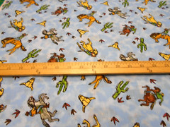 1 yard Cowboys on Blue Fabric