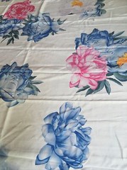 silk 51% and wool 49% floral on white all natural fabric by YARD