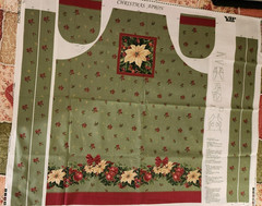 VIP Cranston Christmas Apron panel green with rep Pointsettias