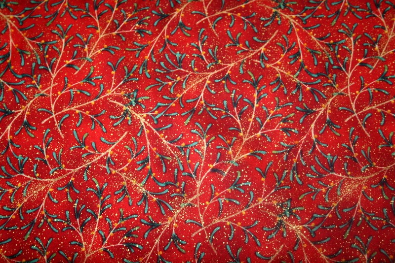 WINTER’S NIGHT-CHRISTMAS GREENERY ON RED FROM MAYWOOD – 100% COTTON FABRIC