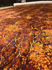 Fabric by the YARD orange, black and yellow snake skin ployester and elastane