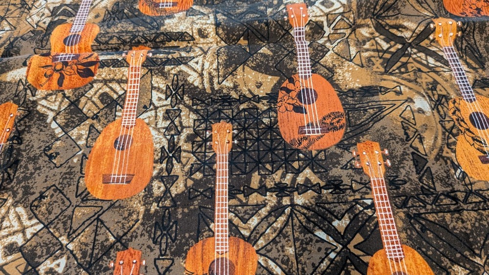 Hawaiian/Polynesian Tribal UKULELE Print w/Tapa Cloth background COTTON FABRIC