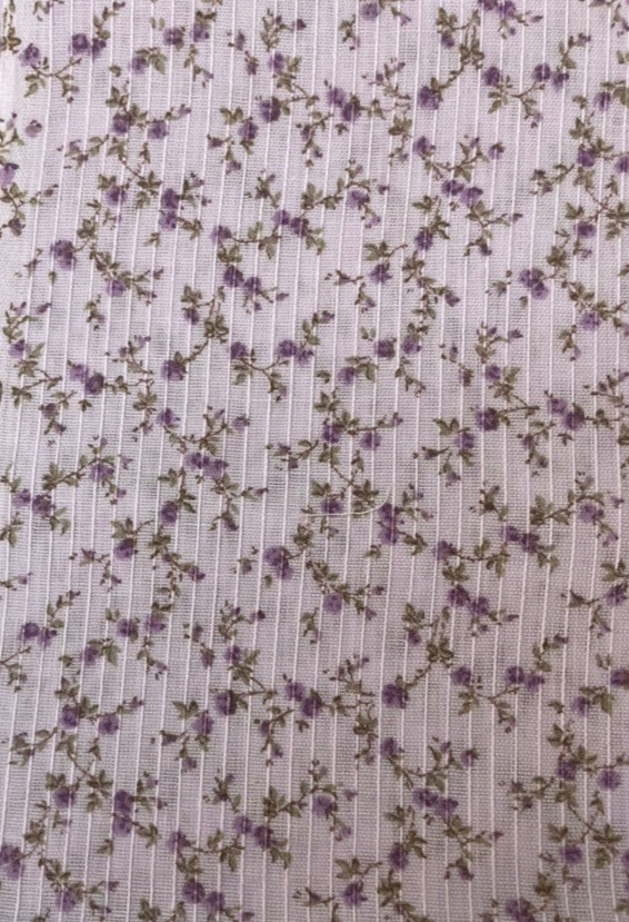 1.5 yard piece of tiny purple flowers on lavendar background by VIP Cranston