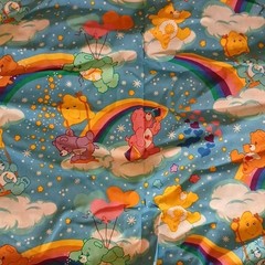 Care Bears Cartoon Print Fabric Blue Rainbow Clouds 44″ W x 89″ L NWOT Vintage