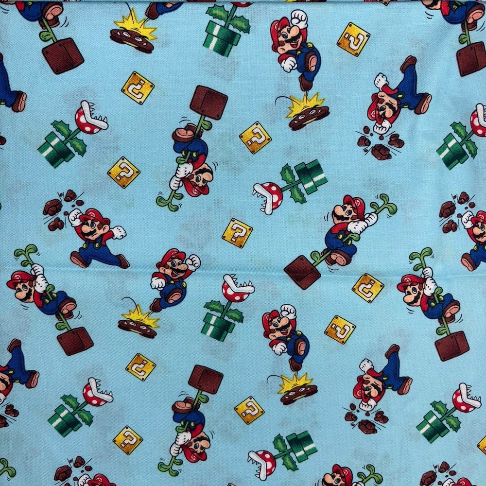 Mario Nintendo Toss Cotton Quilt Fabric By The yard Light Blue Springs Creative