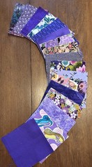 119-5” Squares Of Various Purple Fabric