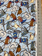 Boots N’ Rope Cowboy on Blue 1/2 Yard (18″ x 44″) JoAnn Cotton Fabric