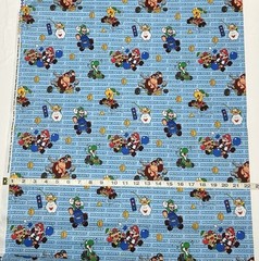 NEW cotton fabric half yard – Mario Kart Action – Characters on Blue Background