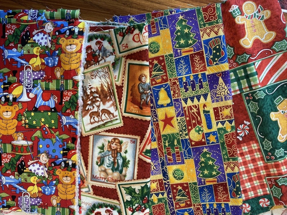 Christmas Fabric – Santa’s Workshop by Fabri-Quilt four pieces of 4 patterns