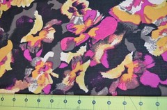 Polyester knit – black fuchsia yellow- soft, drapes well, medium weight 111″x 62