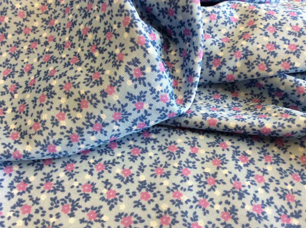 LAVENDER & WHITE MINI FLOWERS ON BLUE POLY-KNIT-60 INCH WIDE- 1 3/8 YARDS