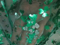 Green and Silver Sharmrock Print on Green Mesh Fabric 60 W x 2 yd AS IS Damaged