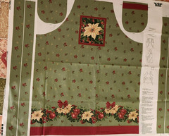 VIP Cranston Christmas Apron panel green with rep Pointsettias