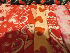 14 PIECES OF 21″ X 5″ F ABRIC PLUS ONE YARD OF FABRIC—-# T 7A-19