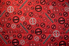 Marvel Deadpool Head Icon Toss Cotton print fabric-SOLD BY THE HALF YARD