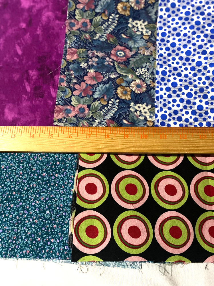 1 pound envelope of cotton fabric remnant pieces /variois colors and prints