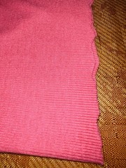 2.1yd (77″)Lx41″W coral pink thin ribbed knit synthetic tubed “cottony” fabric