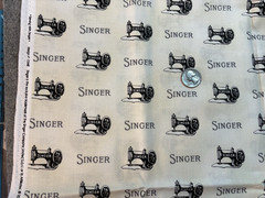 Singer Cotton Fabric Sewing Machine Print cream Black 1 yd x 44″w