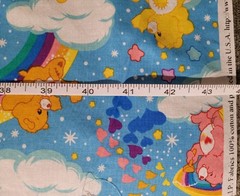 Care Bears On Blue With Clouds & Rainbows vintage 2003 fabric, 18″ X 43″