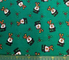 TRENA’S LITTLE BIT OF CHRISTMAS III – SNOWMAN W/SCARVES ON GREEN- 1 3/8 YARDS