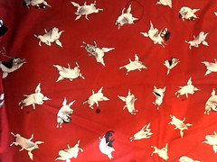 Andover Fabrics Olivia The Pig Frolicking Playing on Red Fabric BTFQ 22″ X 18″