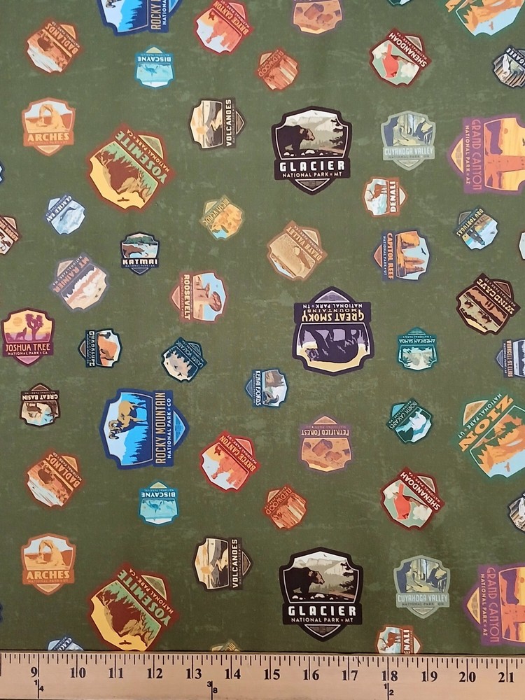 Cotton National Parks Badges Symbols Travel Green Fabric Print by Yard D469.44