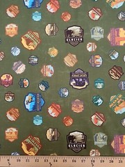 Cotton National Parks Badges Symbols Travel Green Fabric Print by Yard D469.44