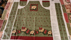 VIP Cranston Christmas Apron panel green with rep Pointsettias