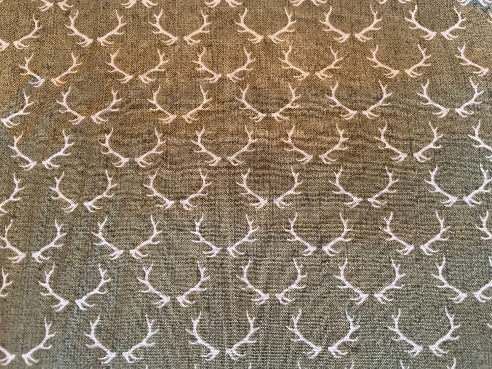 4.25 yards of Timeless Treasures fabric. Antlers!