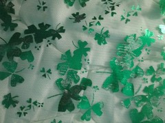 Green and Silver Sharmrock Print on Green Mesh Fabric 60 W x 2 yd AS IS Damaged