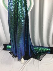 GREEN IRIDESCENT MINI SEQUINS EMBROIDER ON A BLACK MESH-FASHION-SOLD BY YARD.