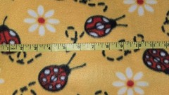 Blizzard Fleece Lady Bugs on Yellow By The Yard