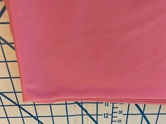 NEW: One yard by 58″ (less cut-out as pictured) of “CORAL ROSE” PolyesterKnit