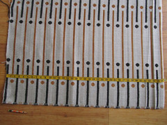 Schumacher’s Serapo Carbon Ochre Black Gold Ivory lines circles modern fabric 1y