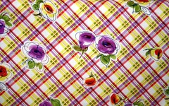 PURPLE AND ORANGE FLOWERS ON YELLOW, RED AND PURPLE PLAID- 100% COTTON FABRIC