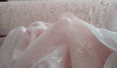 Discount embroidered pink Voile 110″ wide by yard. Semi sheer. Free swatches.