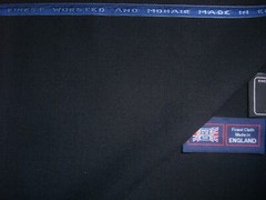 60% MOHAIR & 40% WOOL SUITING FABRIC IN BLACK MADE IN ENGLAND = 285 g/m. = 3.8 m