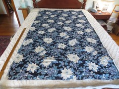 5055. VIP Cranston POINSETTIAS & BOWS on NAVY COTTON FABRIC – 43-1/2″ x 2 yds.
