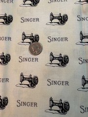 Singer Cotton Fabric Sewing Machine Print cream Black 1 yd x 44″w