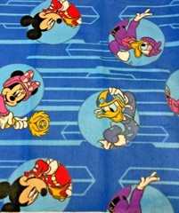 MICKEY AND FRIENDS BADGE TOSS FLEECE BY THE YARD