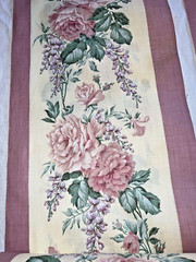 2 rolls ~150 total yds mauve cotton(?) 11″W floral border print fabric, +8 pcs