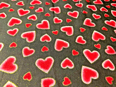NEW!! PINK AND RED GLITTERY HEARTS ON BLACK FABRIC-10.5″ L X 44″ W