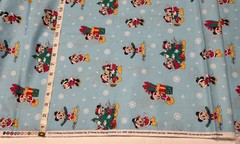 NEW Cotton Fabric Mickey and Friends Christmas Day on Light Blue – HALF YARD