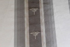 Serengeti Stripe, a silk and linen woven high-end decorator material in neutrals