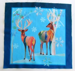 Deer Horns Snowflakes on Light Blue Pic B- 10 1/2″ L x 10 1/4″ W Light Blue Edge