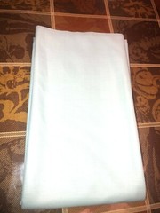 54″L x 62″W light aqua/mint green knit fabric remnant, medium weight & stretch