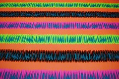 TIE DYE STRIPE ORANGE PINK POLYESTER LYCRA SPANDEX ATHLETIC UNIFORM FABRIC